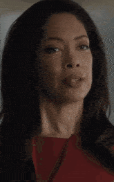 a woman in a red shirt says " are you trying to force my hand ? "