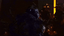 a close up of a monster with horns and spikes on it