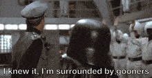 a man in a black helmet says i knew it i m surrounded by gooners