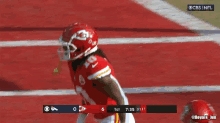 a football player wearing a helmet with the number 40 on it