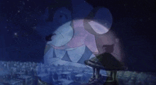 a cartoon character is standing in front of a city at night with a projector projected on it .