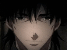 a close up of a person 's face with a shadow on it .