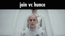 a sign that says join vc hunce with two people