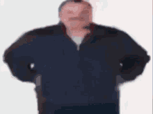 a blurry picture of a man wearing a black jacket