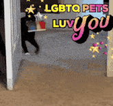 a sign that says lgbtq pets luv you with a person holding a box