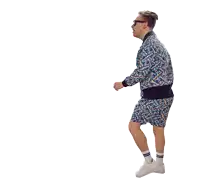 a man in a blue jacket and shorts is dancing with his arm outstretched