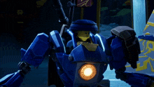 a blue robot with a yellow light on it