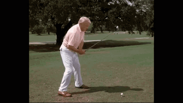 [Image: ted-knight-golf-tee.gif]