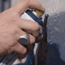Spraying On A Wall Glossblack GIF