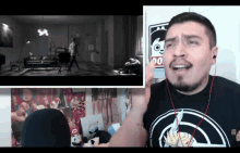 a man wearing a black t-shirt with a captain america logo on it reacts to a video