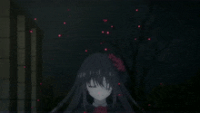 a girl with long black hair and a red flower in her hair