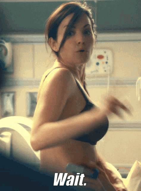 Erica Durance Take Off GIF - Erica Durance Take Off Hot - Discover