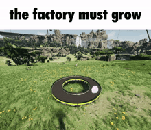a video game scene with a circle in the middle and the words the factory must grow