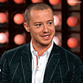 a close up of a man 's face with the words joequinncraves on the bottom right