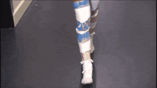 a woman wearing knee high boots and a pink tail