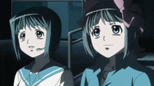 two anime girls are standing next to each other with one wearing a headset