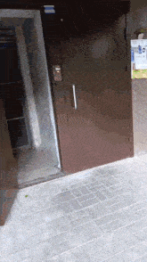a brown door with a sticker on it that says ' a ' on it