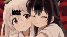 two anime girls are hugging each other and one of them has chinese writing on her face