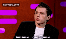 a man in a suit is talking on a television show and says `` you know ... i don 't know ''