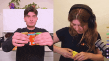a man and a woman are playing a game on a computer screen
