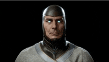 a man wearing a helmet with blue eyes is looking at the camera in a video game .