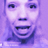 a close up of a woman 's face with the words this is scary below her