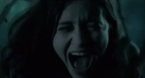 woman screaming in horror gif