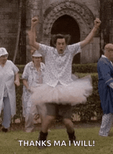 a man is wearing a tutu and dancing in a park .