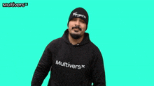 a man wearing a beanie and a hoodie that says multivers
