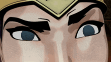 a close up of a cartoon character 's eyes with a crown on their head