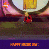 a cartoon character is on a stage with the words happy music day