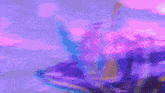 a close up of a purple and blue object