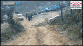 a picture of a dirt road with a chery logo on the bottom