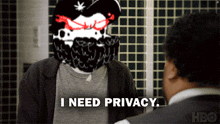a man with a beard is talking to another man and says i need privacy
