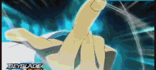 a close up of a person 's hand with the word beyblade on the bottom