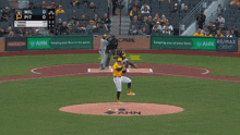 a baseball game is being played in a stadium with ahn advertisements on the wall