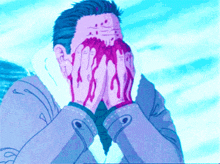 a man covering his face with his hands with blood coming out of his mouth