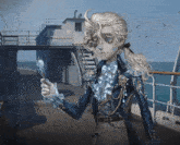 a man with horns on his head is standing on a boat holding something