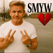 a man in a white shirt giving the middle finger in front of a broken heart and the word smyw