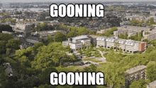 an aerial view of a city with the words ' going ' and ' going ' above it