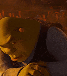 shrek from the animated movie shrek is smiling