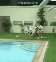 a group of people are jumping into a swimming pool with the caption allaboutklang
