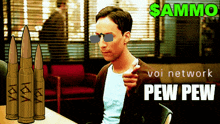 a man sitting at a table with bullets in front of him and the words ammo voi network pew pew on the bottom