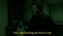a man in a dark room with the words " you can 't fucking do this to me "