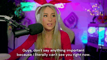 a woman wearing bunny ears is talking into a microphone and says " guys don 't say anything important