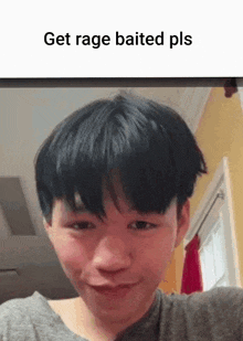 a young man with short hair is smiling and looking at the camera with a caption that says get rage baited pls