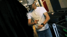 a man wearing a hat that says a on it