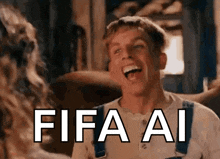 a man in overalls is laughing and the word fifa ai is on the screen behind him
