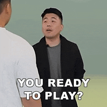 a man talking to another man with the words " you ready to play "