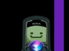 a nokia cell phone with a smiley face on it
